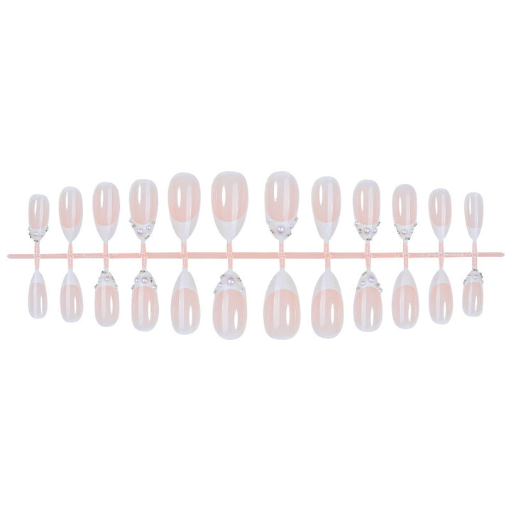 Elegant Press-On Nail Set with Pearlescent Accents Bowlift