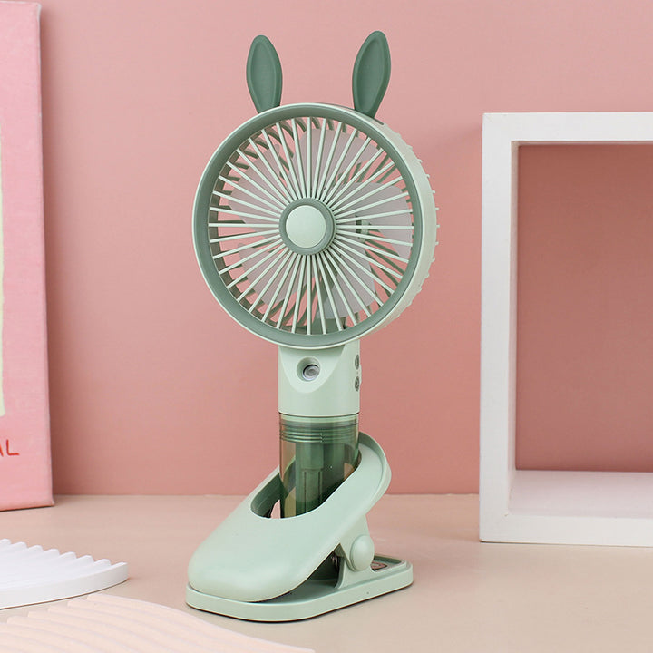 Cooling compact rechargeable clip-on misting handheld fan with detachable water reservoir and adjustable tilt Bowlift