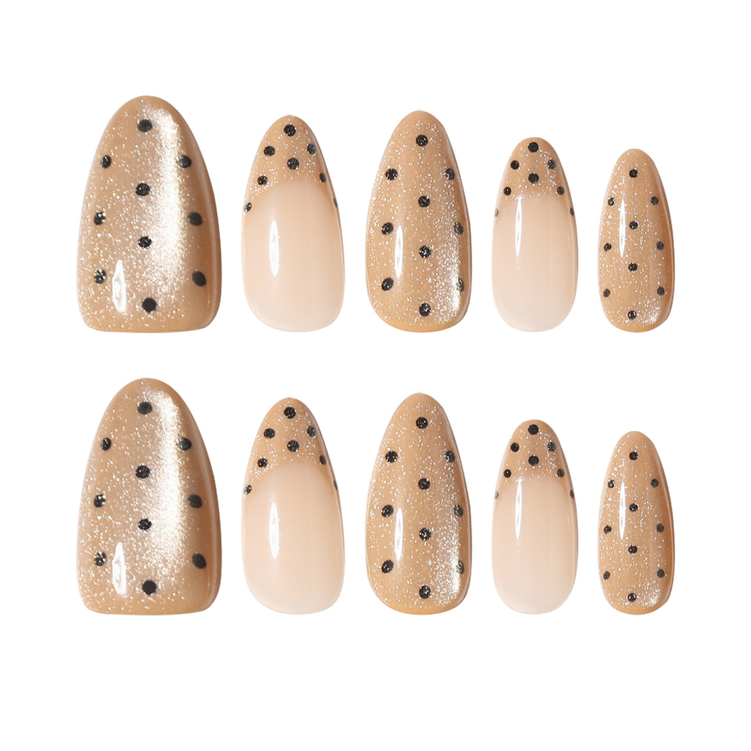 Elegant stiletto nails with glitter and dot design Bowlift