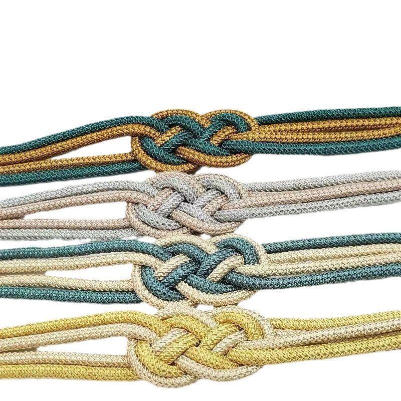 Decorative curtain tieback with braided design Bowlift
