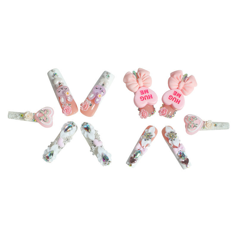 Creative nail art set with playful animal and heart motifs Bowlift