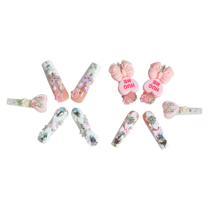 Creative nail art set with playful animal and heart motifs Bowlift
