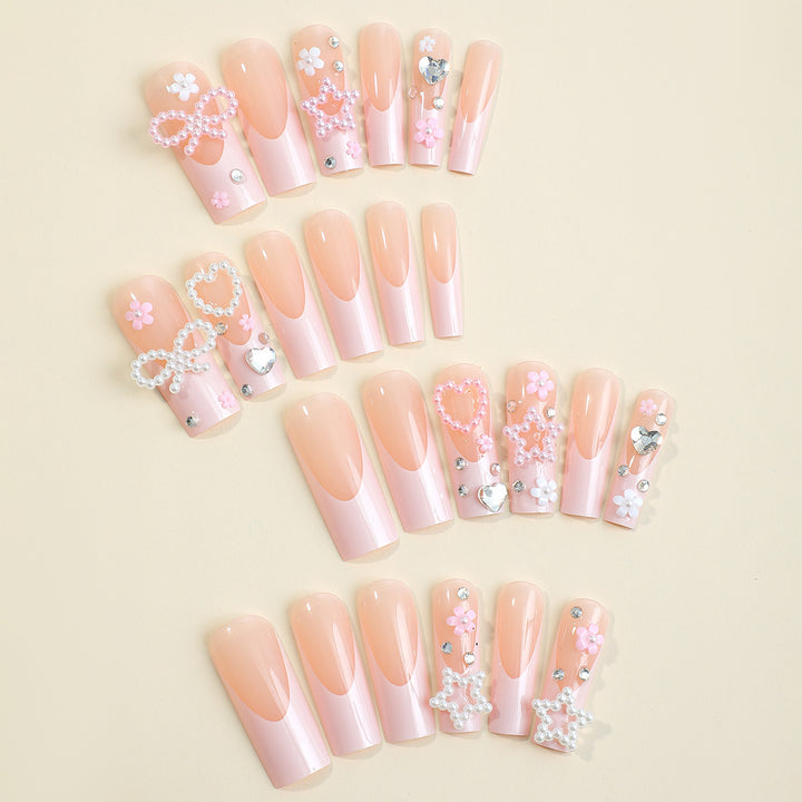 Glamorous artificial nail design with golden accents Bowlift