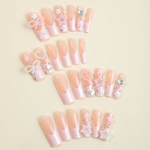Glamorous artificial nail design with golden accents Bowlift
