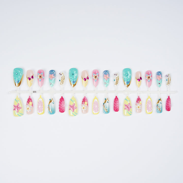 Colorful artificial nails with rhinestones Bowlift