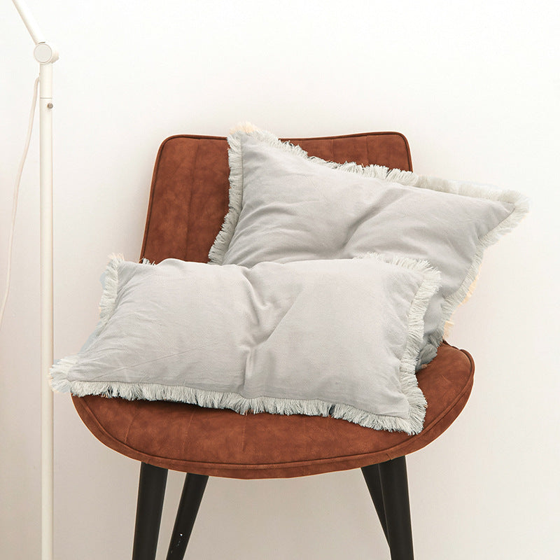 Textured Fringed Lumbar Pillow