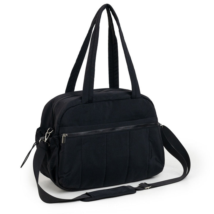 Padded travel bag with practical outer pockets Bowlift