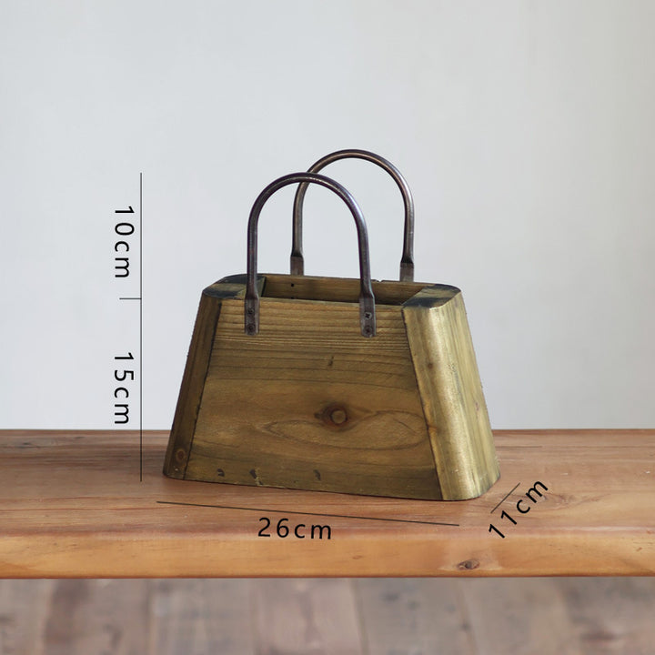 Handcrafted wooden basket with metal handles Bowlift