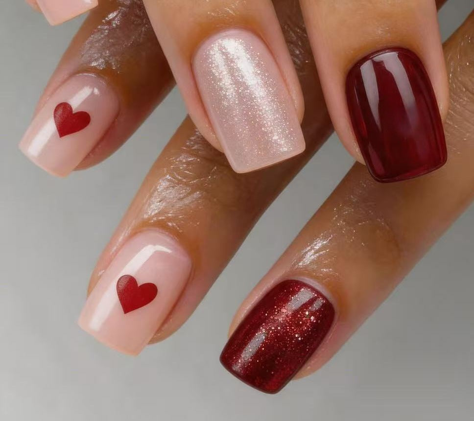 Art nail set with heart designs and glitter Bowlift