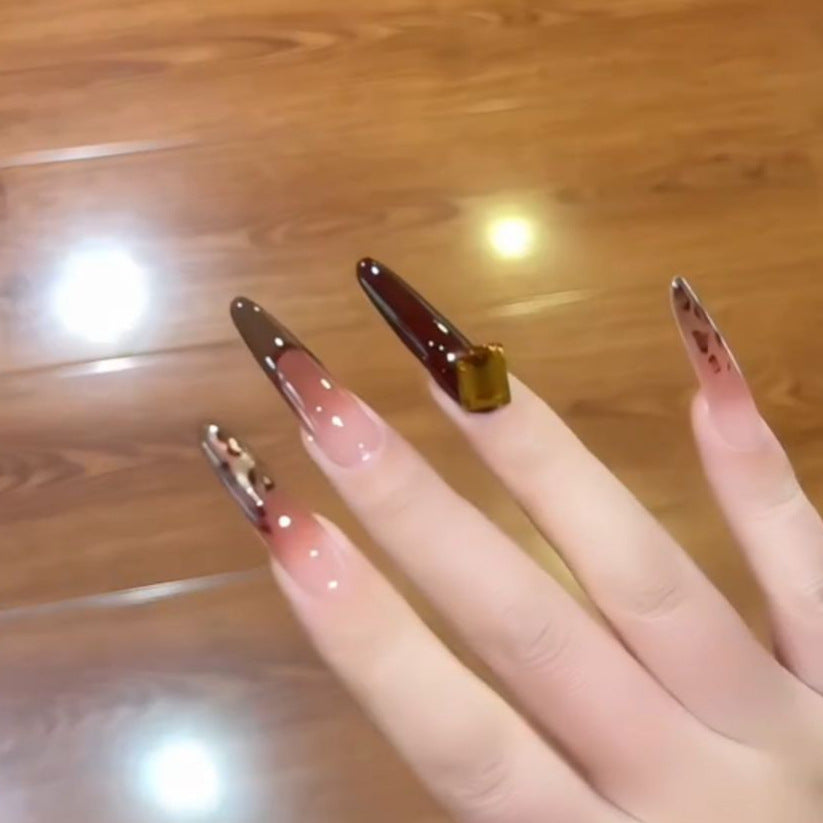 Artificial nails with elegant glitter and gold accent design Bowlift