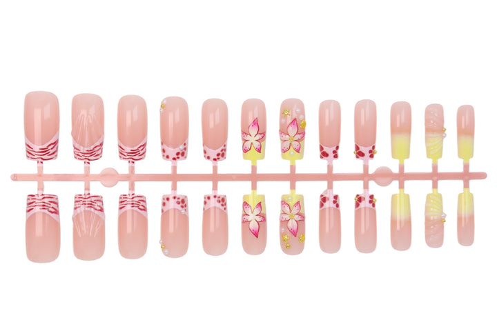 Nail art set with floral accents and glitter decorations Bowlift