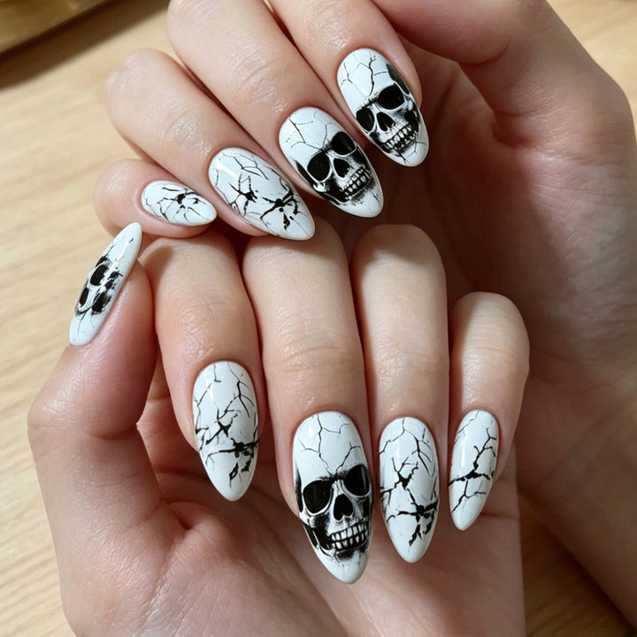 Artificial nails with playful skull design and crackle effects Bowlift