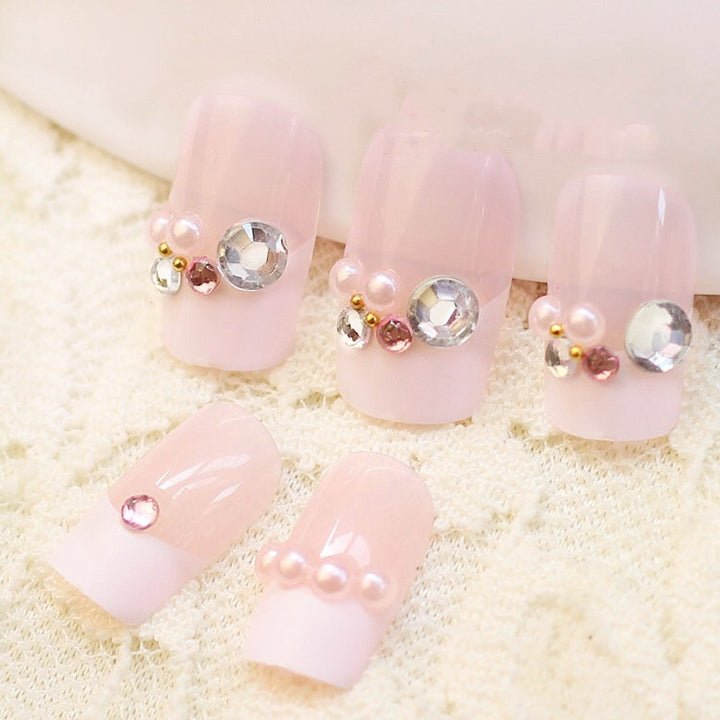 Artificial nails with elegant flower and rhinestone design Bowlift