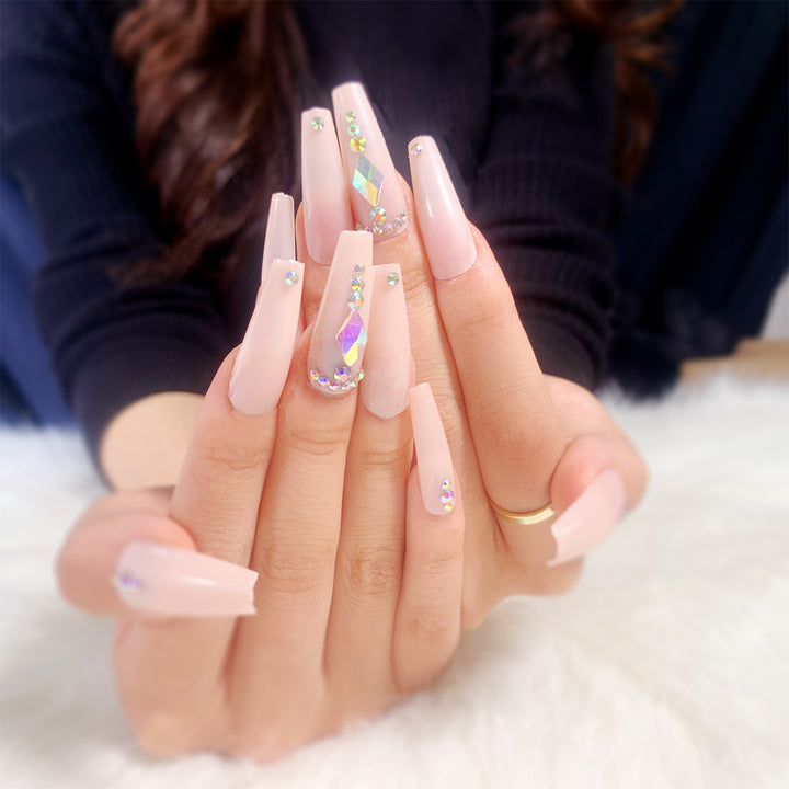 Glamorous nail extensions with rhinestone embellishments Bowlift