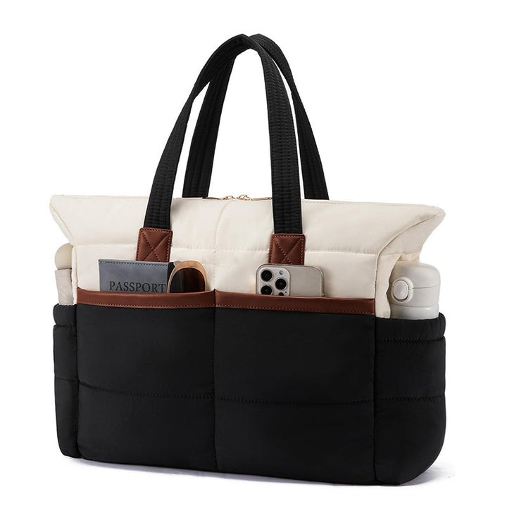 Practical handbag with multiple compartments Bowlift