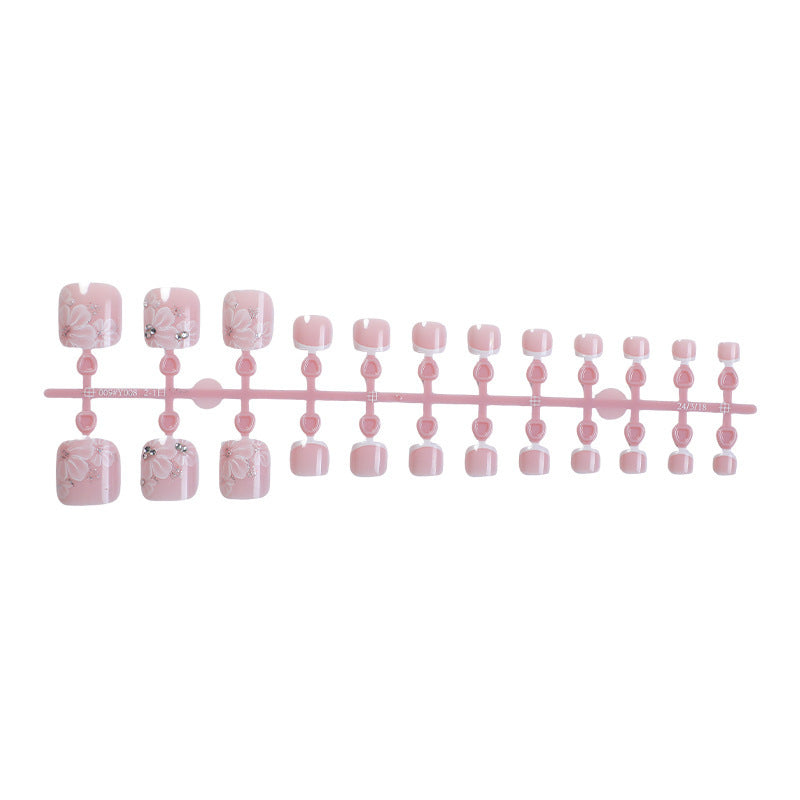 Nail art set with delicate floral design and glitter accents Bowlift