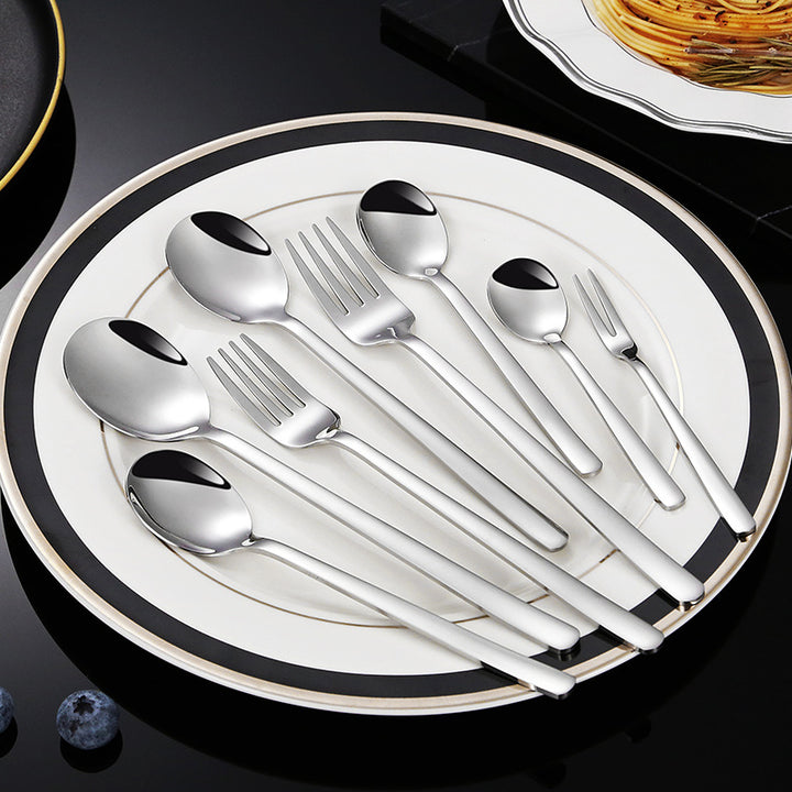 Elegant dessert spoon with luxurious golden surface Bowlift