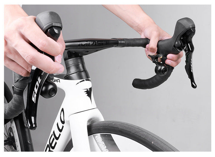 compact bicycle handlebar bell with quick release clamp and ergonomic thumb lever Bowlift
