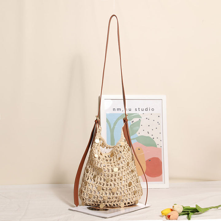 Hand-knotted shoulder bag with metal appliqués Bowlift