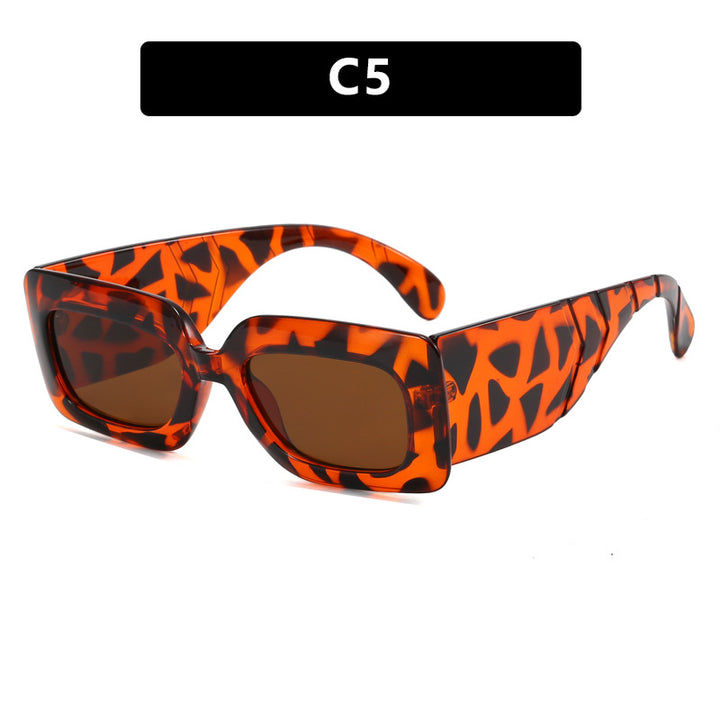 Women extravagant sunglasses with striking snake pattern Bowlift