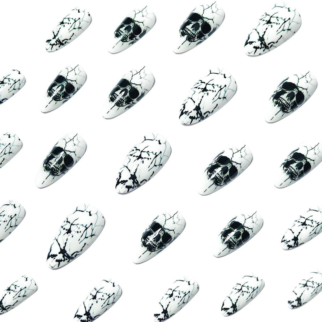 Artificial nails with playful skull design and crackle effects Bowlift