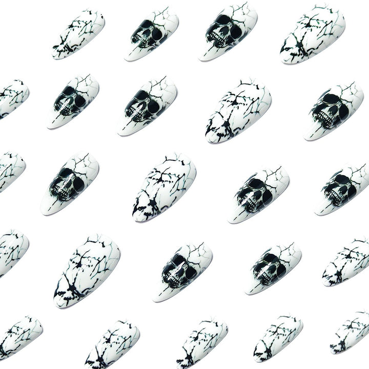 Artificial nails with playful skull design and crackle effects Bowlift