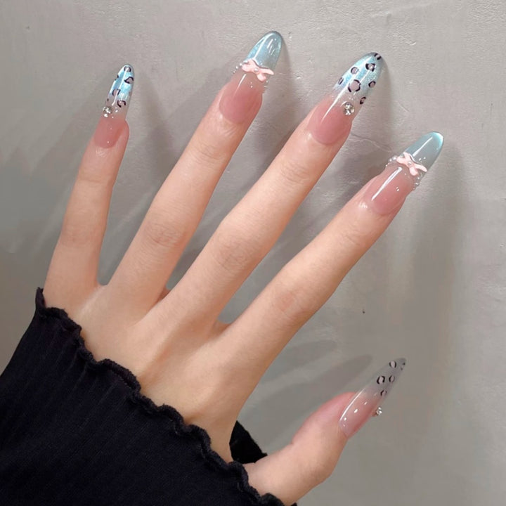 Elegant Stiletto Press-On Nail Set with Unique Floral and Ribbon Accents Bowlift