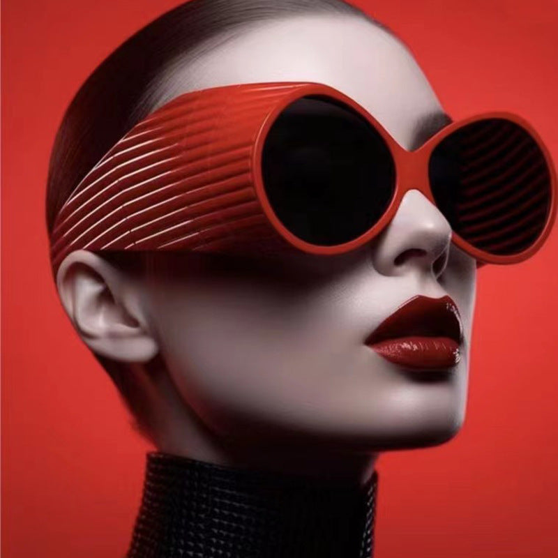 Women's extravagant sunglasses with curved frame Bowlift