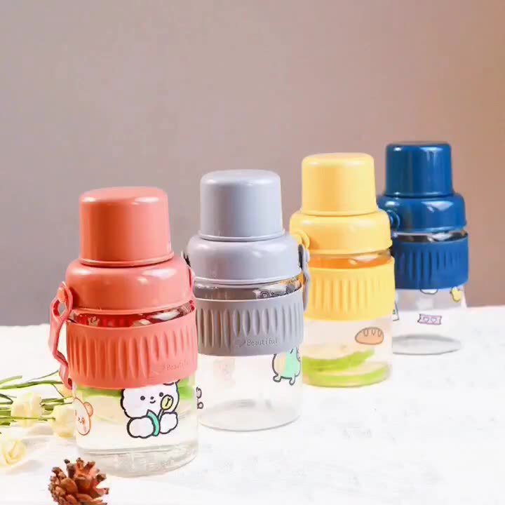 Ladies trendy glass drinking bottle with practical silicone protection Bowlift