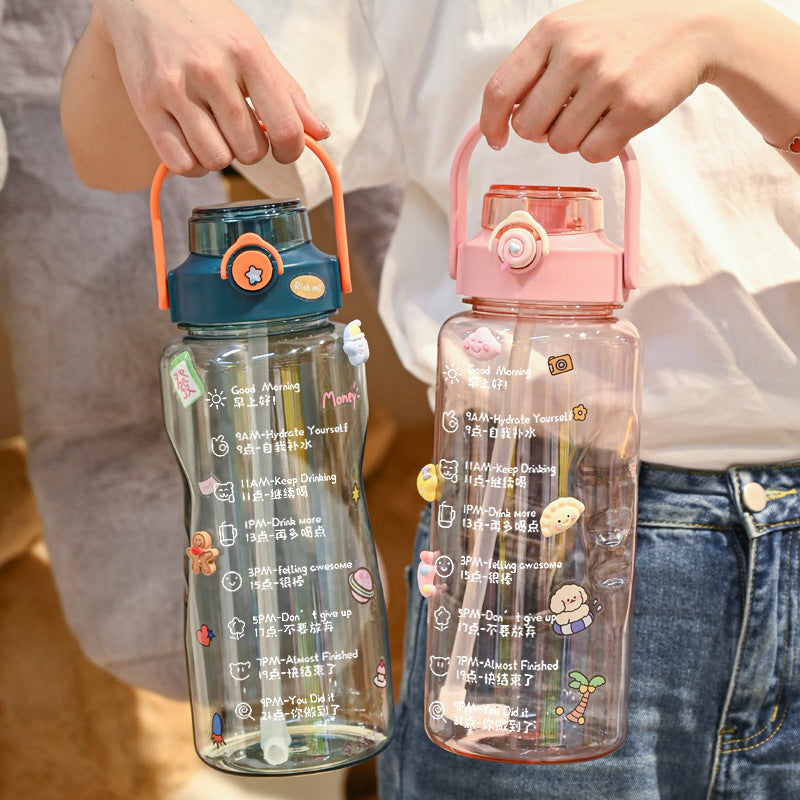 Women’s water bottle with integrated time marking and practical carrying handle Bowlift