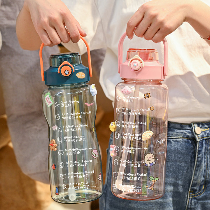 Women’s water bottle with integrated time marking and practical carrying handle Bowlift