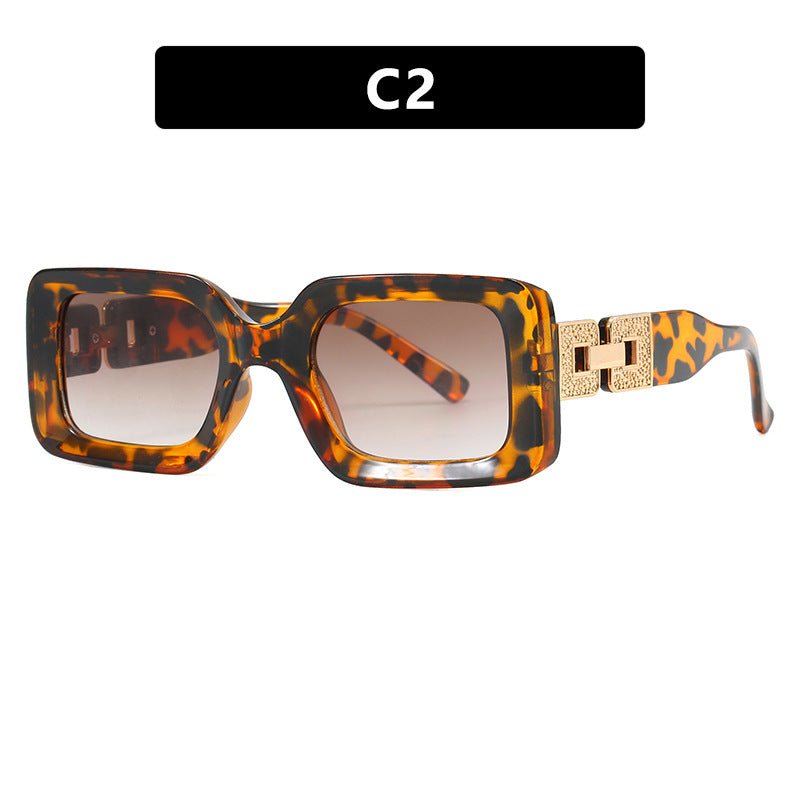 Women’s fashionable sunglasses in elegant square design with luxurious golden accents Bowlift