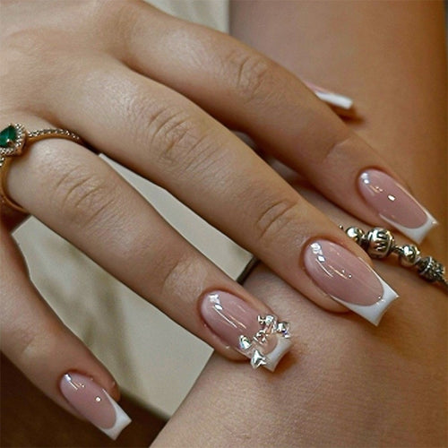 Elegant artificial nails with delicate glitter and decorative accents Bowlift