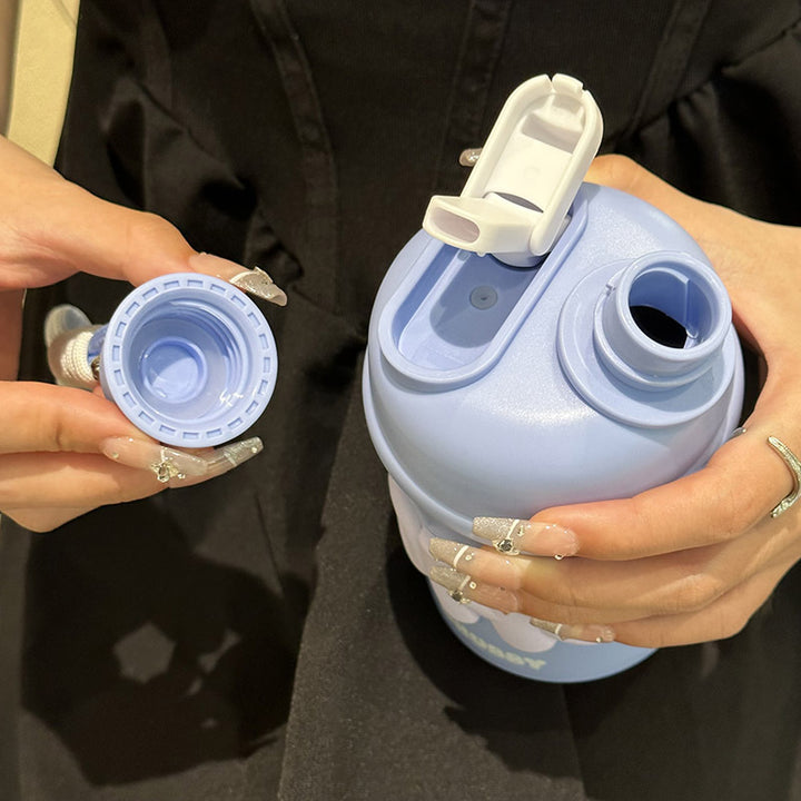 Ladies insulated water bottle with ergonomic carrying handle and cheerful design Bowlift