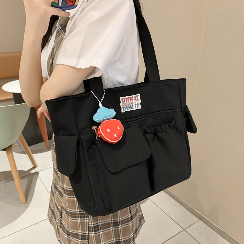 Tote bag with versatile compartments and ergonomic design Bowlift