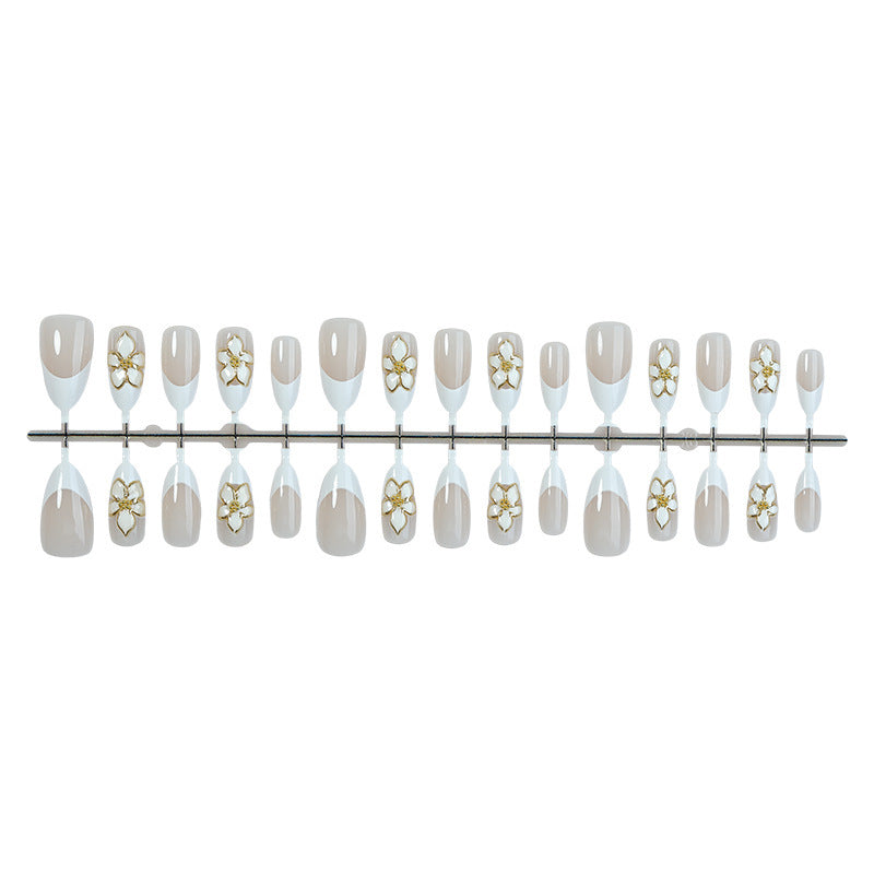 Artificial nail set with elegant flowers and glitter decorations Bowlift