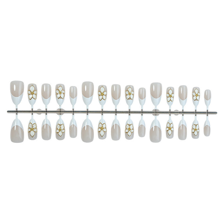 Artificial nail set with elegant flowers and glitter decorations Bowlift