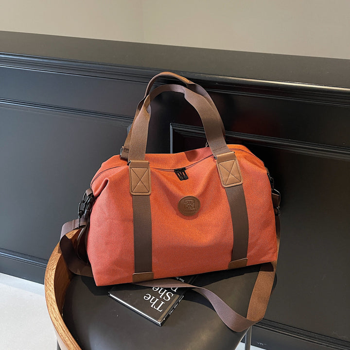 Sporty Duffel Bag With Multiple Compartments And Adjustable Shoulder Strap Bowlift