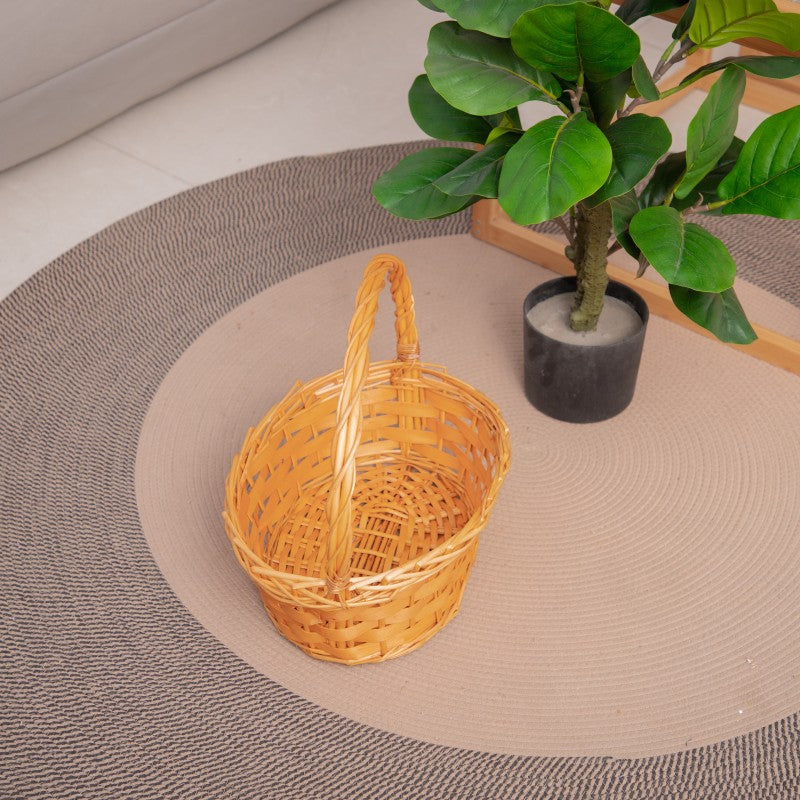 Handcrafted basket with practical handle