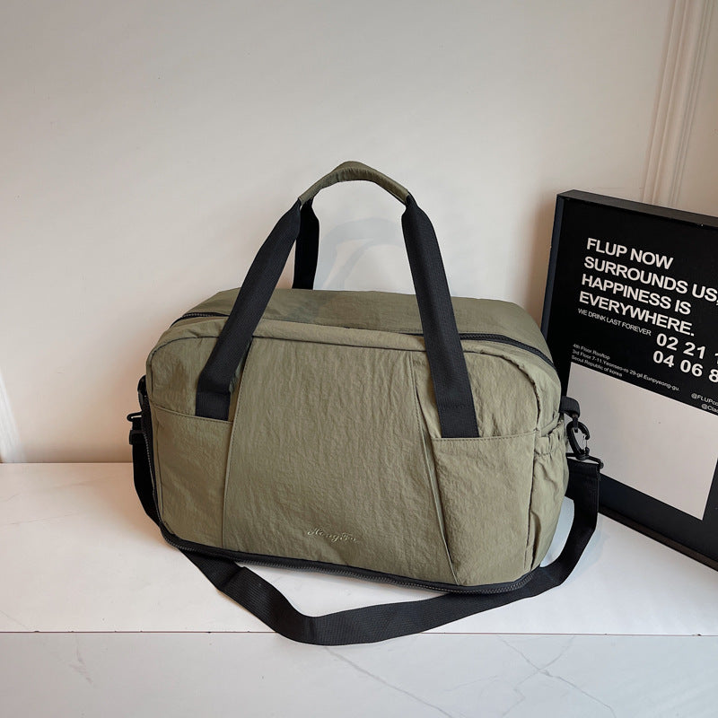 Sporty travel bag with practical outer pockets Bowlift