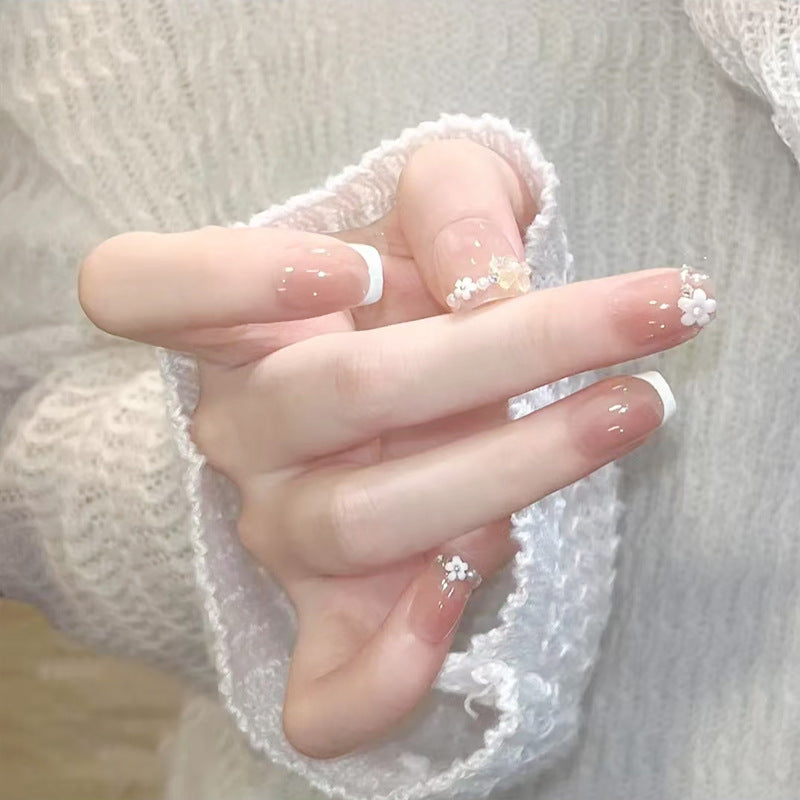 Nail set with elegant flower appliqués and exquisite glitter embellishments Bowlift