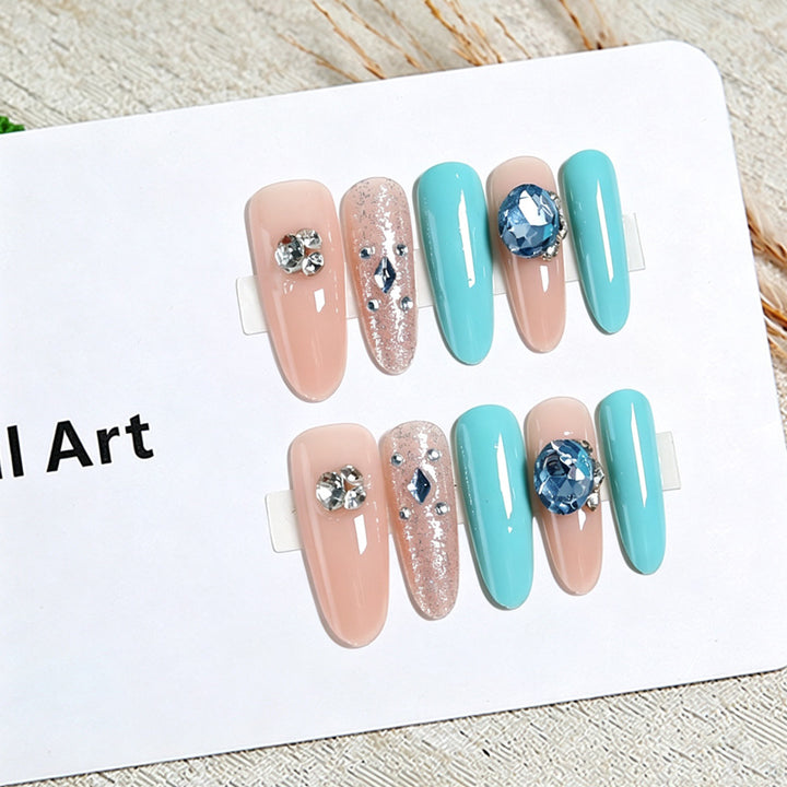 Artificial nail set with glamorous 3D applications and sparkling design Bowlift