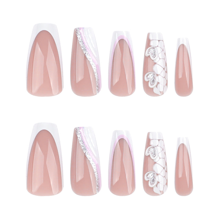 Artful Nail Extensions with Heart Design and Glitter Accents Bowlift