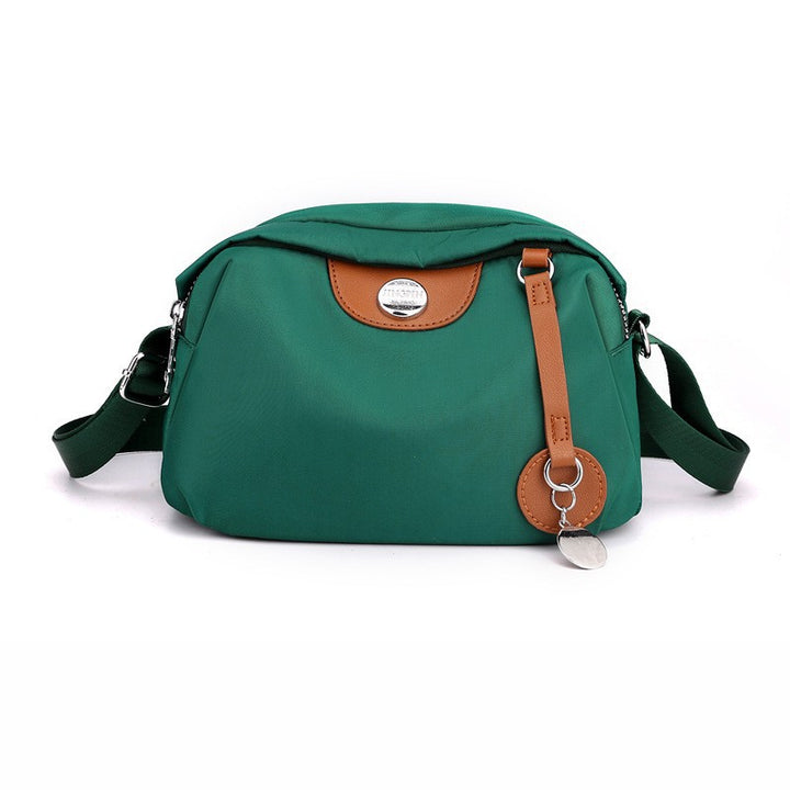 Shoulder bag with adjustable shoulder strap and clear compartment system Bowlift