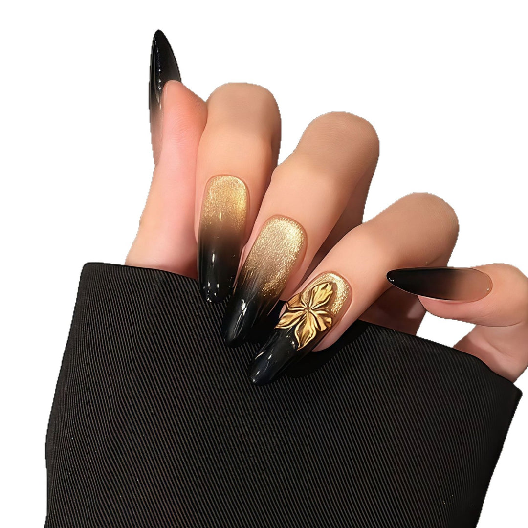 Glamorous artificial nails with intricate flower and glitter effects Bowlift
