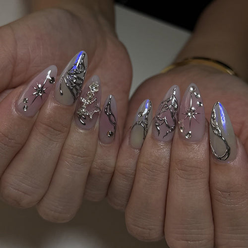 Artistic nail art with unique 3D decorations and glitter accents Bowlift