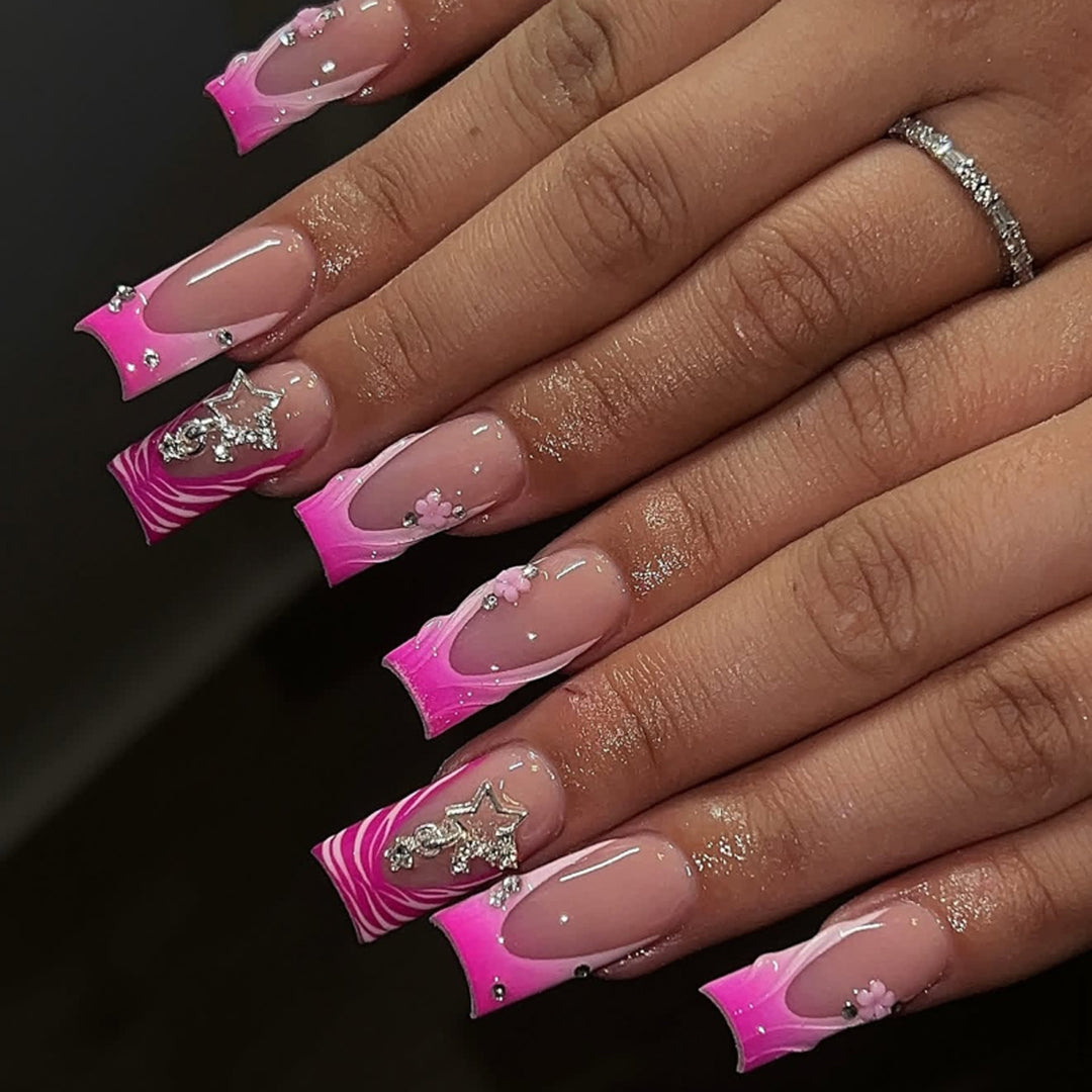 Artful nail designs with glitter and floral accents Bowlift