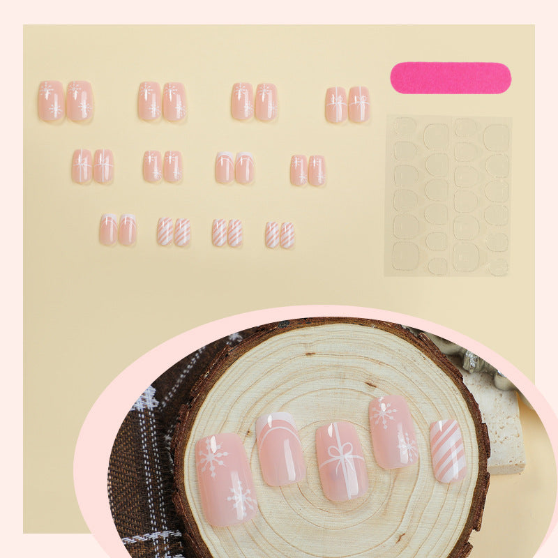 Nail set with elegant floral and striped designs Bowlift