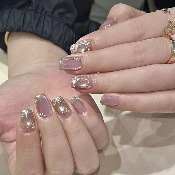 Artistic Nail Art with Glitter and Ombre Effect Bowlift