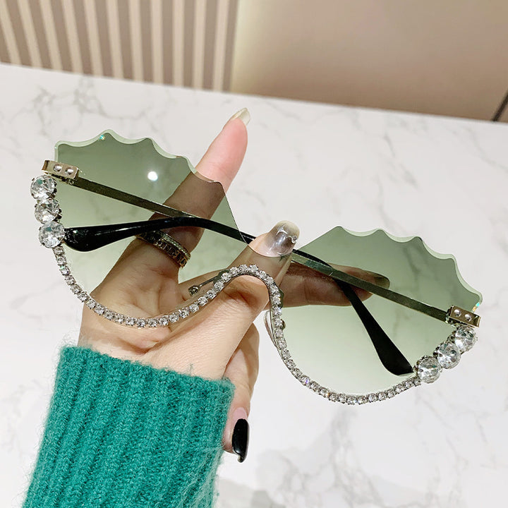 Women's extravagant sunglasses with sparkling accent and unique design Bowlift